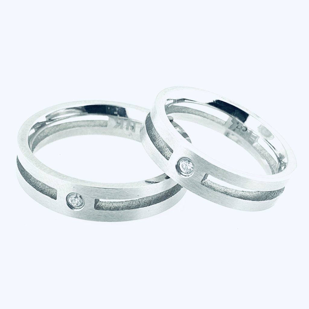 ARGOLLA DOS BRAZOS PARALELOS CIRC 0.04 AL CENTRO 